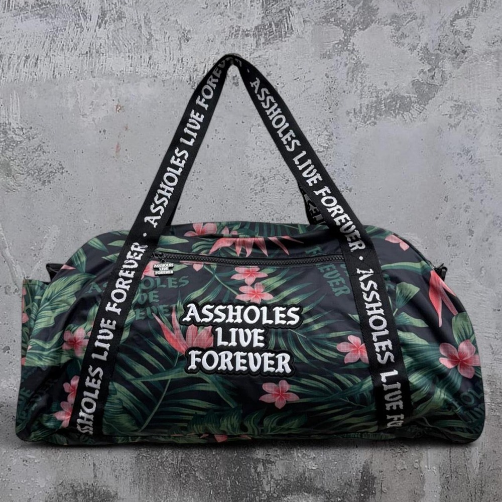 Assholes Live Forever Duffle Bag Emotional Baggage with floral pink flowers